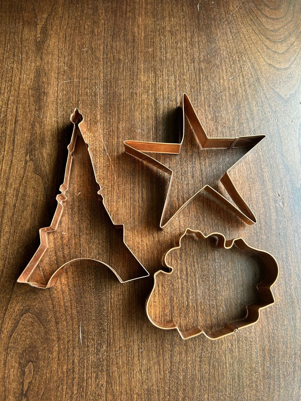 Three copper cookie cutters Eiffel Tower star
